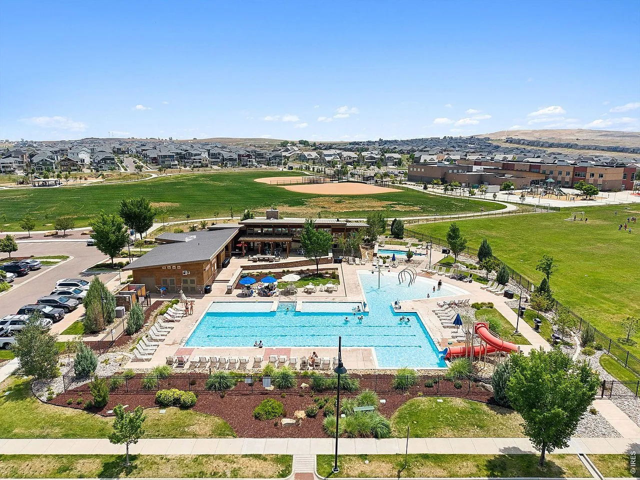 Aerial view of the pool complex, sports fields and neighborhood school