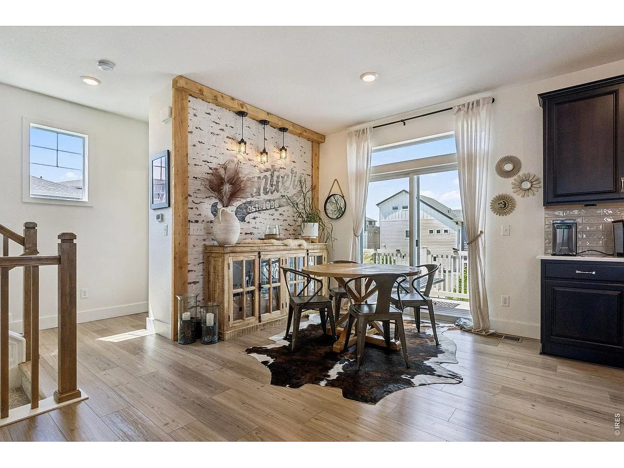 Dining area beside the sliding door to the balcony deck