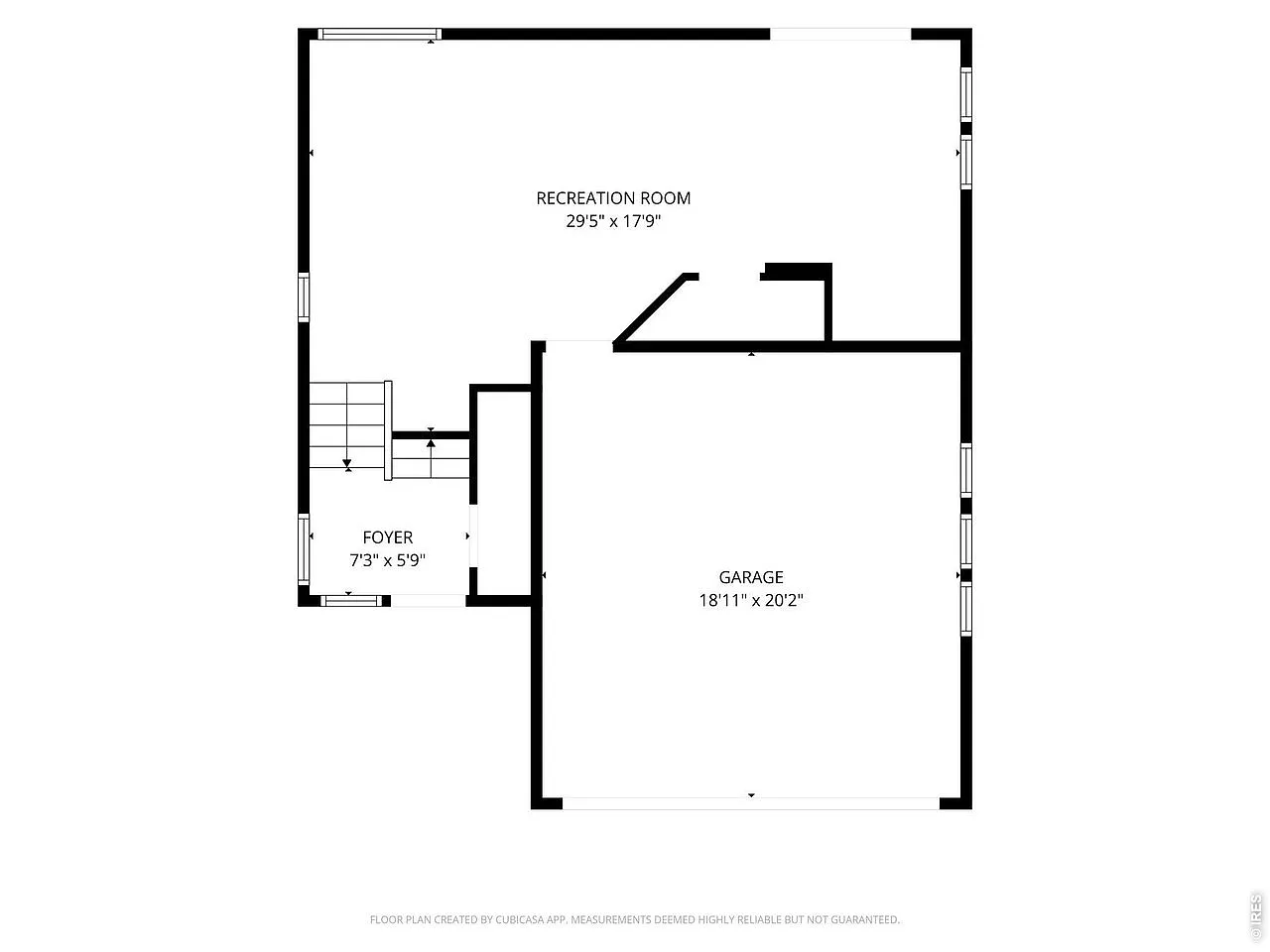 Walkout level floor plan: rec room, foyer and two-car garage